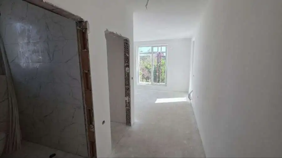 Bright, unfurnished studio apartment in La Mer Silver Residence 2, just 500m from the sea in Sunny B.