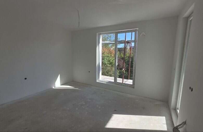 Bright empty studio with large window near Sunny Beach, Bulgaria.