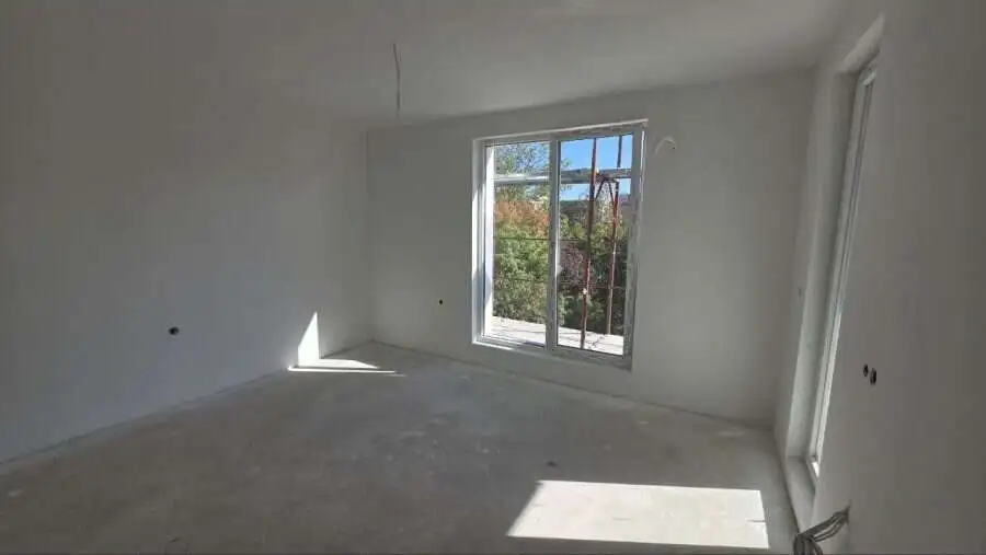 Bright empty studio with large window near Sunny Beach, Bulgaria.