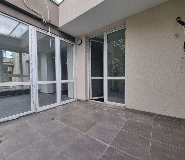 Terrace of a 1-bedroom top-floor apartment in Villa Martini, Sunny Beach, near the sea.