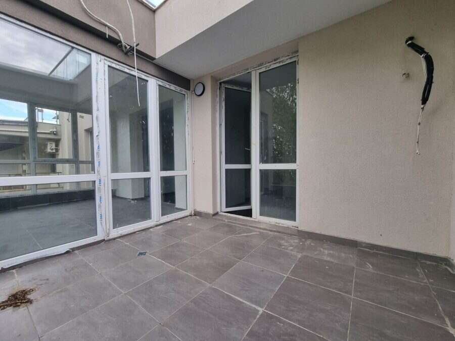 Terrace of a 1-bedroom top-floor apartment in Villa Martini, Sunny Beach, near the sea.