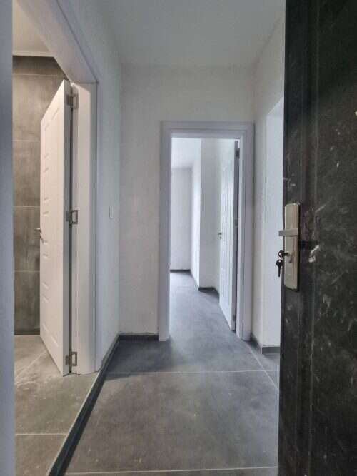 Interior view of a clean, bright hallway in a 1-bedroom apartment near Sunny Beach, Bulgaria.