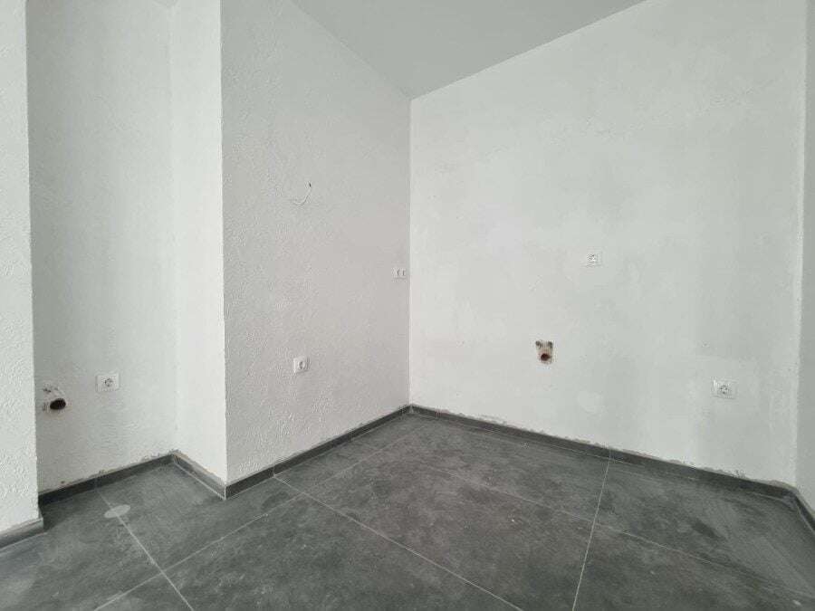 Interior view of a 1-bedroom top floor apartment with a large terrace in Villa Martini, near Sunny B.