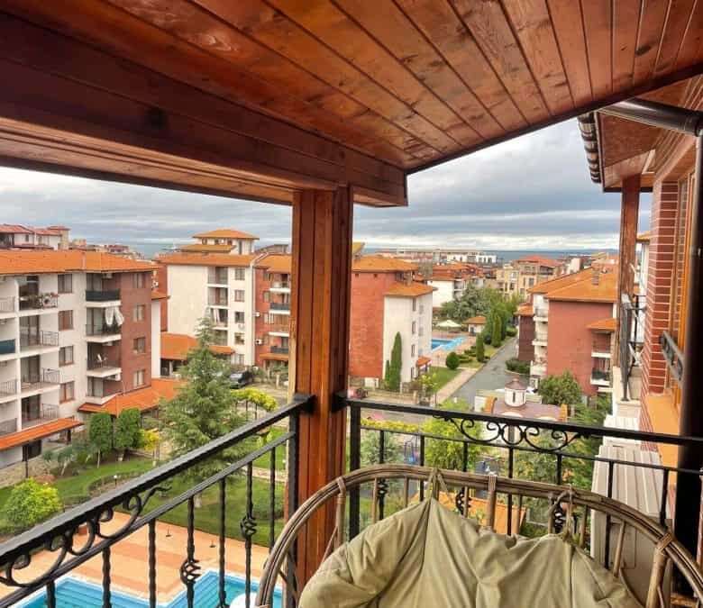 Balcony with sea and pool views in a 2-bedroom apartment in Apollon 8, near Ravda and Nessebar.