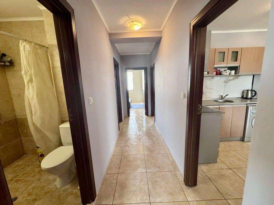 Interior view of a hallway with bathroom and kitchen in Apollon 5, Bulgaria.
