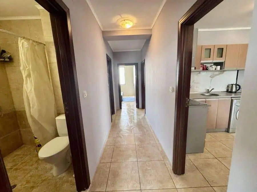 Interior view of a hallway with bathroom and kitchen in Apollon 5, Bulgaria.