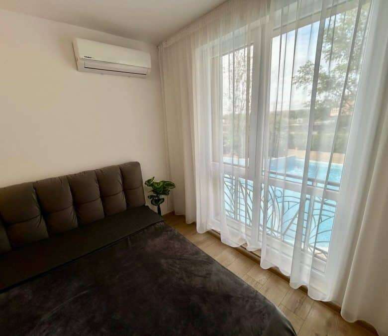 Modern 1-bedroom apartment overlooking the pool in Aphrodite Green, Sunny Beach. Perfect for relaxin.