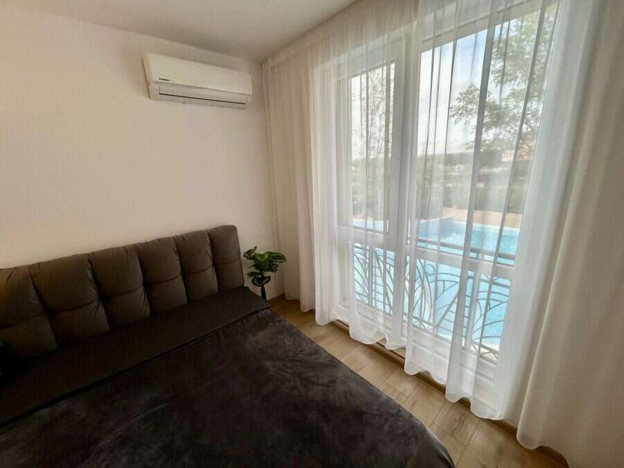 Modern 1-bedroom apartment overlooking the pool in Aphrodite Green, Sunny Beach. Perfect for relaxin.