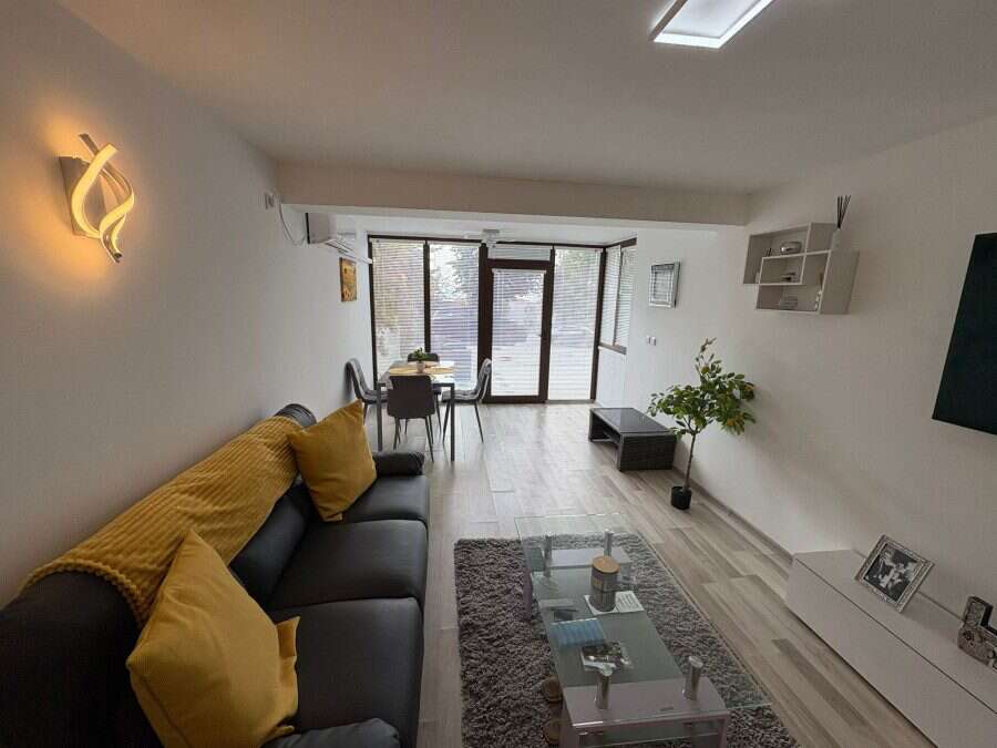 Spacious 83 sq.m. apartment with bright living area, no maintenance fee, and convenient access to ou.