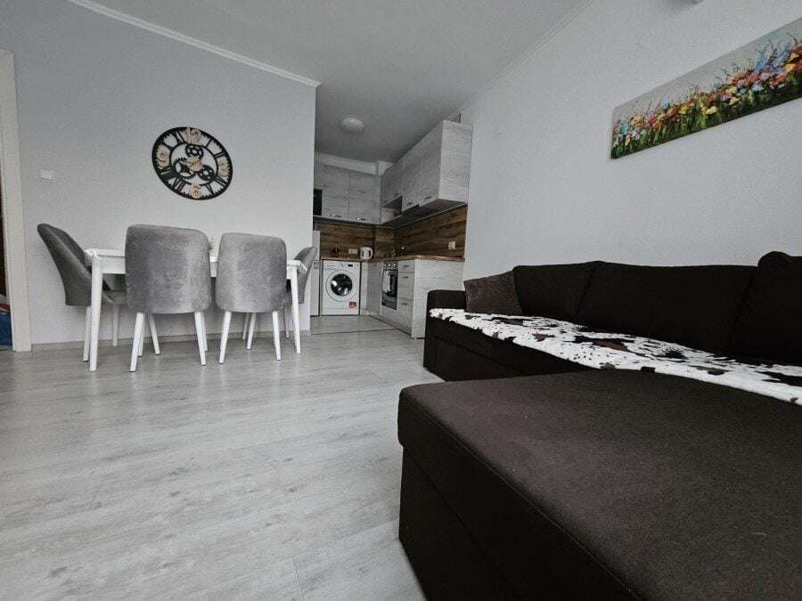 Apartment with pool views, modern decor, and a spacious living area in Yassen near Sunny Beach.