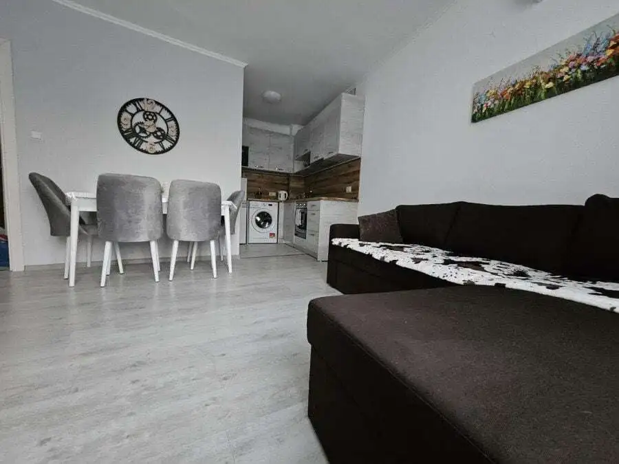 Apartment with pool views, modern decor, and a spacious living area in Yassen near Sunny Beach.
