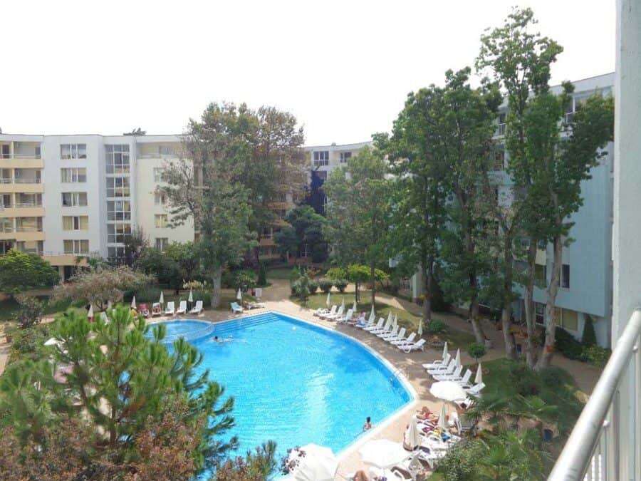 Bright pool view from a modern 1-bedroom apartment in Yassen, Sunny Beach, near the sea.