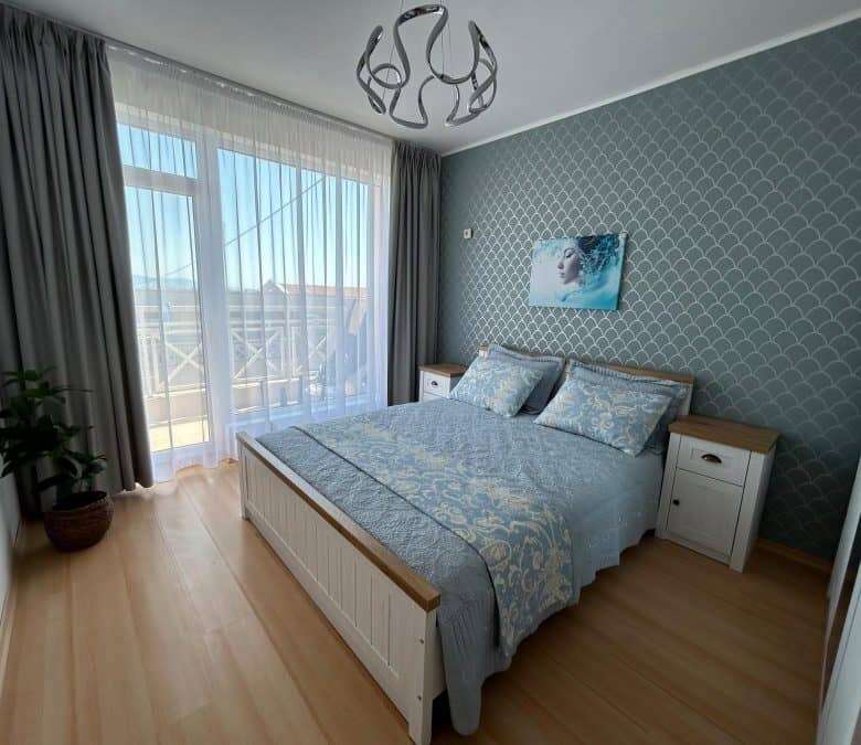 Elegant 1-bedroom top floor apartment with stylish furniture and 57 sq.m. space, perfect for sunny d.