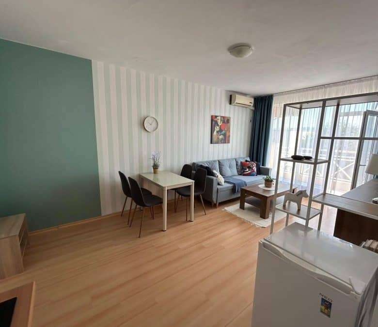 Bright 1-bedroom top floor apartment with elegant furniture and 57 sq.m. space, perfect for comforta.