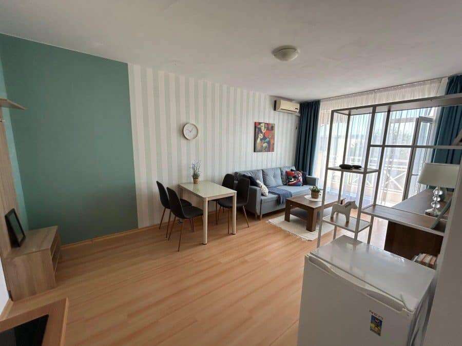 Bright 1-bedroom top floor apartment with elegant furniture and 57 sq.m. space, perfect for comforta.