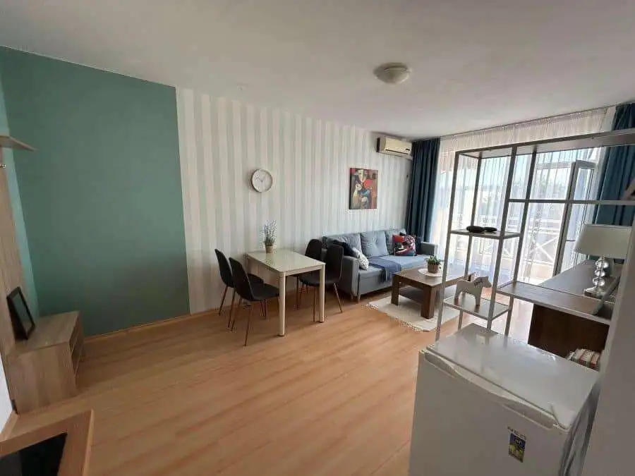 Bright 1-bedroom top floor apartment with elegant furniture and 57 sq.m. space, perfect for comforta.