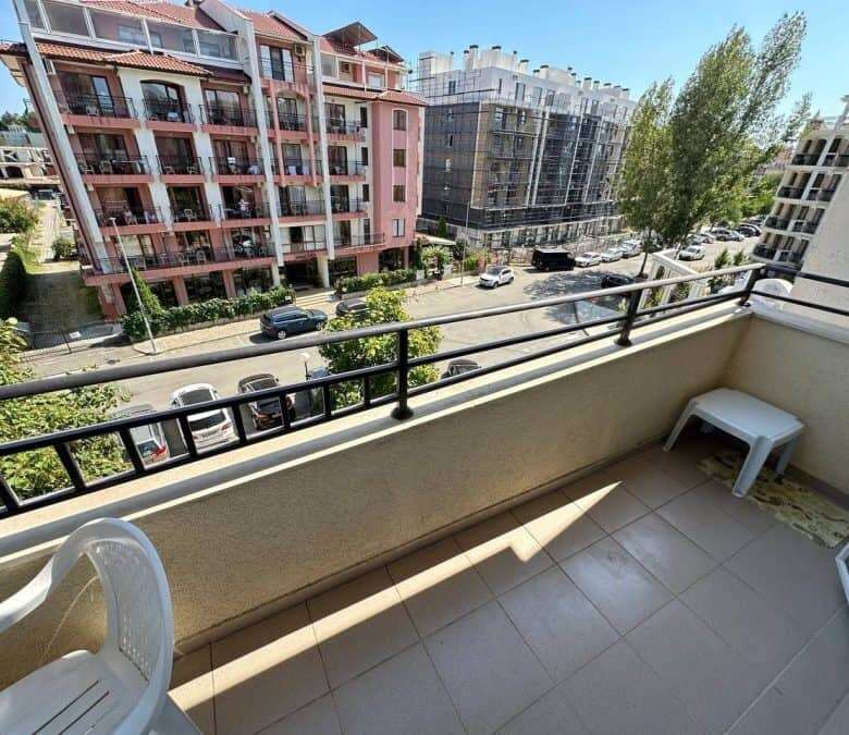 Balcony of a furnished 1-bedroom apartment in Grand Kamelia, Sunny Beach, offering a relaxing outdoo.