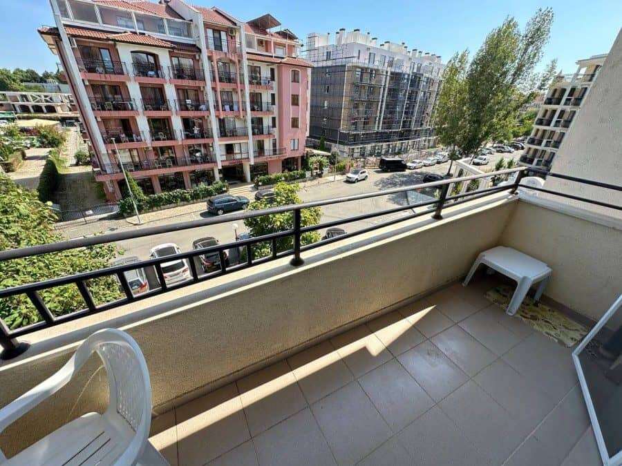 Balcony of a furnished 1-bedroom apartment in Grand Kamelia, Sunny Beach, offering a relaxing outdoo.