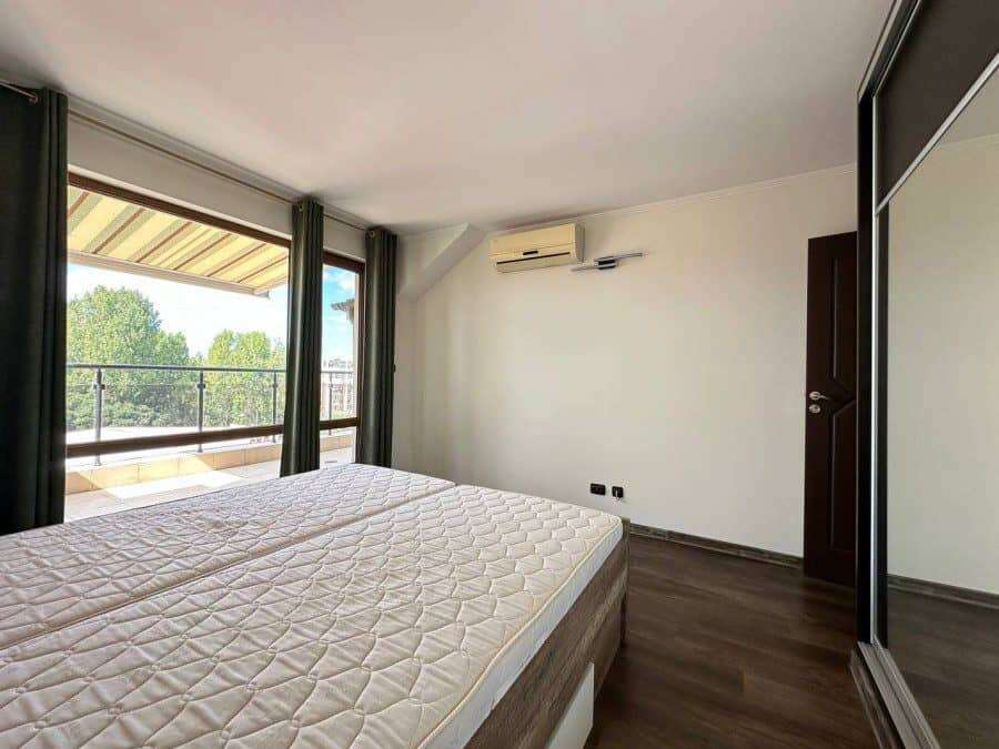 Modern 1-Bed Top Floor Apartment in Sunny Beach Bright bedroom in top-floor apartment near the sea in Sunny Beach, Bulgaria.