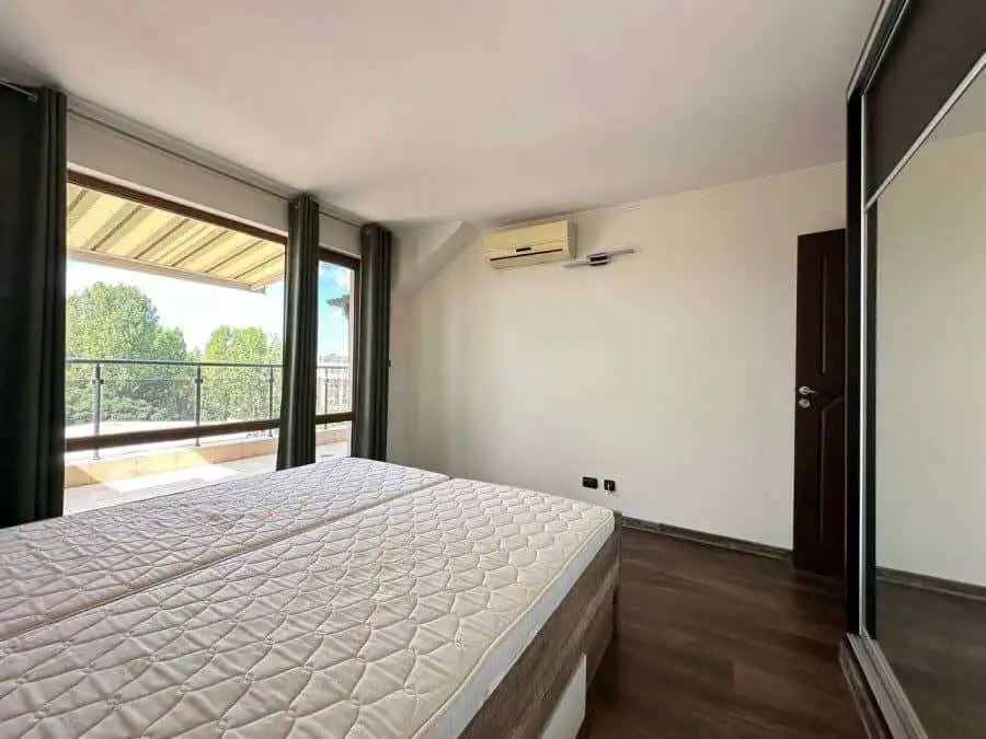Bright bedroom in top-floor apartment near the sea in Sunny Beach, Bulgaria.