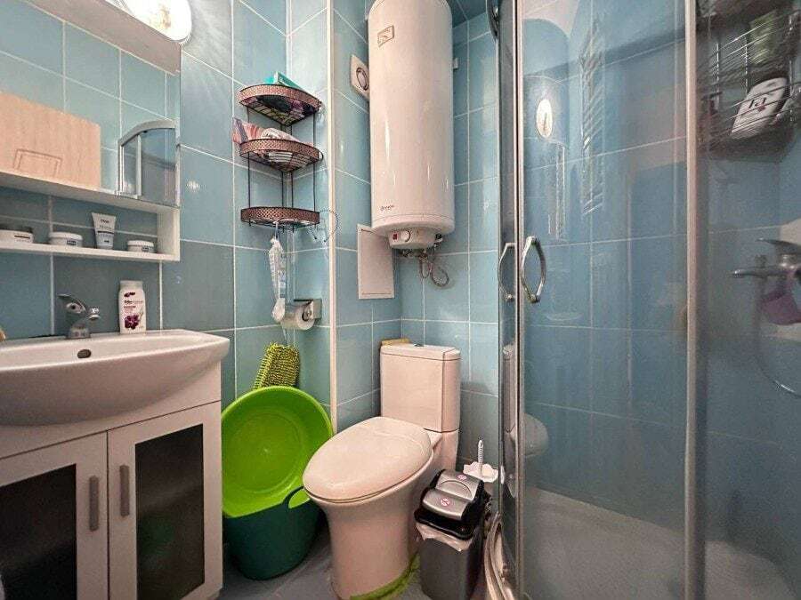 Small bathroom in a 1-bedroom apartment close to the sea in Nessebar, Bulgaria.