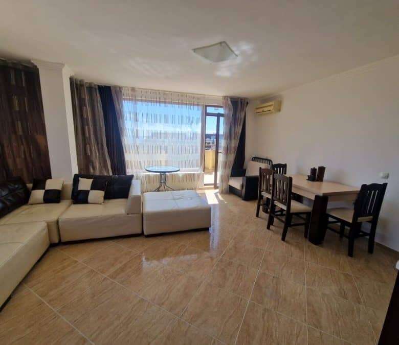 Sea view living room with large windows and balcony in Sveti Vlas.