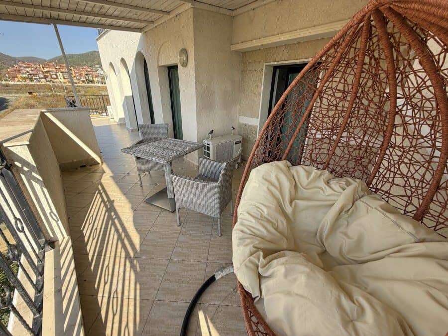 Sea view balcony with outdoor seating in Sveti Vlas.