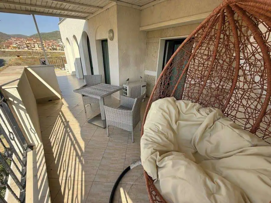 Sea view balcony with outdoor seating in Sveti Vlas.
