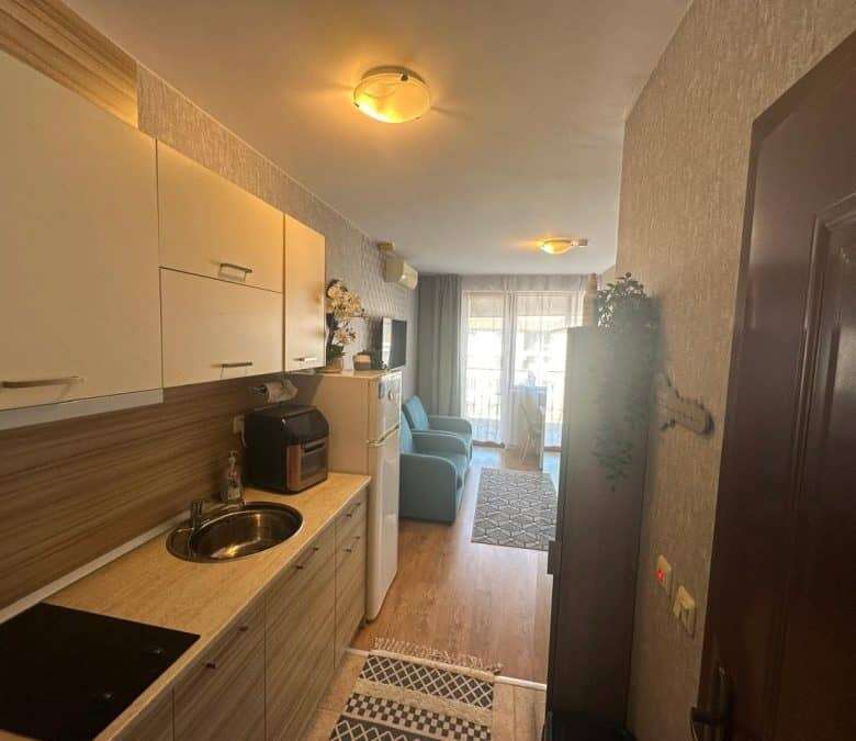 Apartment with pool view, compact living space, and modern amenities in Apollon, Ravda.