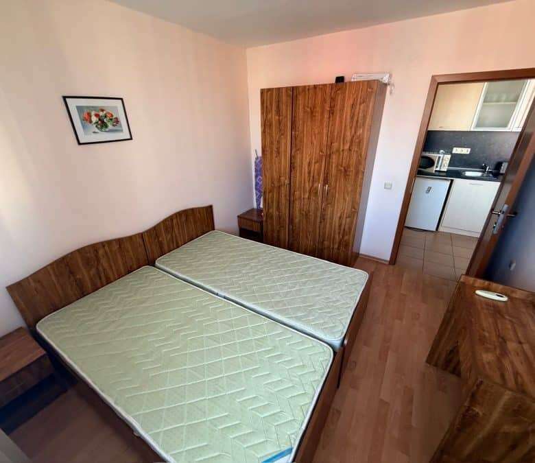 Comfortable bedroom with two beds in Holiday Fort Club, Sunny Beach.