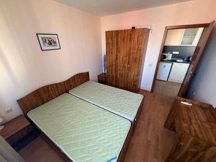Comfortable bedroom with two beds in Holiday Fort Club, Sunny Beach.