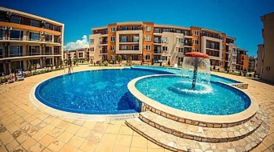 Bright outdoor pool area at Holiday Fort Club in Sunny Beach, Bulgaria.