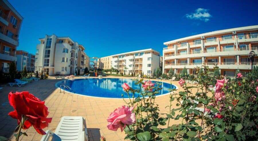 Bright view of the pool and surrounding apartments at Holiday Fort Club, Sunny Beach, just 900m from.