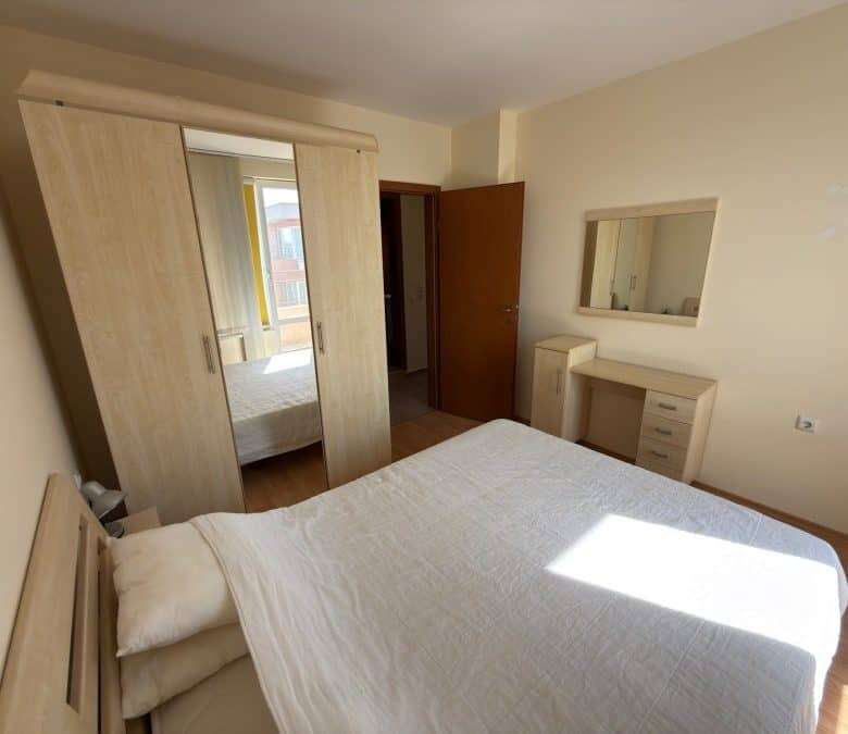 Cozy 2-bedroom top floor apartment in Sunny Beach near the sea, with bright interior and wardrobe.