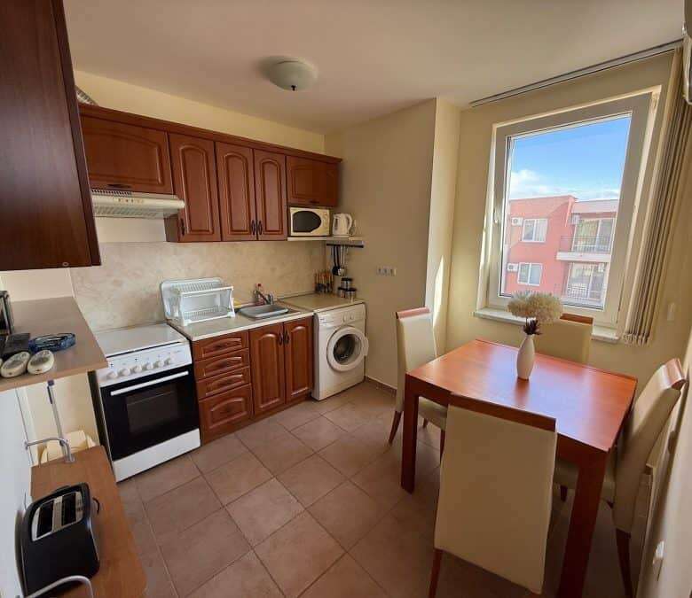 Bright interior of a top-floor 2-bedroom apartment at Holiday Fort Club, just 900m from the sea in S.