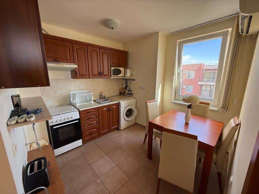 Bright interior of a top-floor 2-bedroom apartment at Holiday Fort Club, just 900m from the sea in S.
