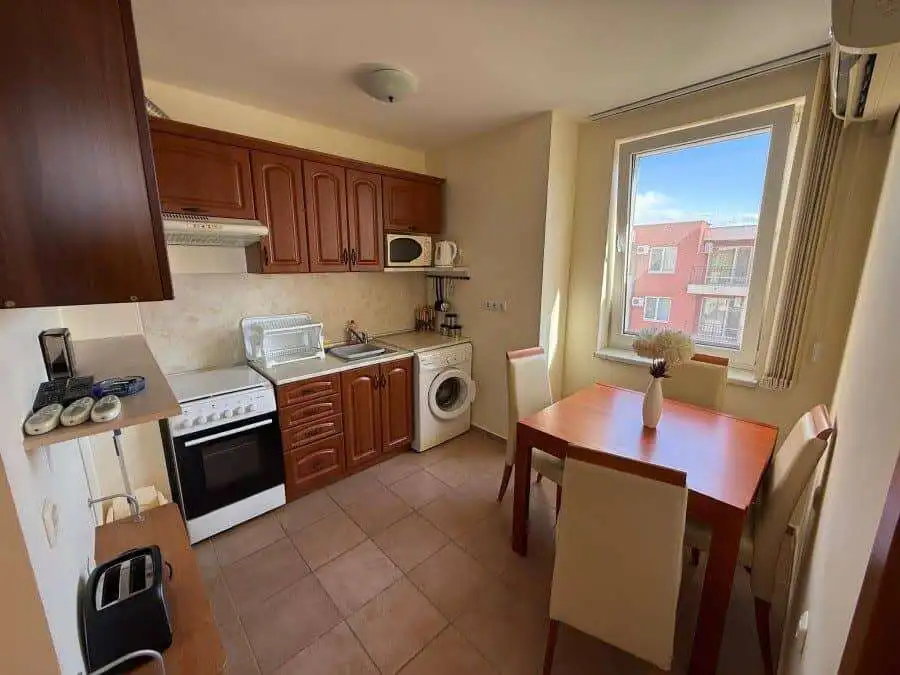 Bright interior of a top-floor 2-bedroom apartment at Holiday Fort Club, just 900m from the sea in S.