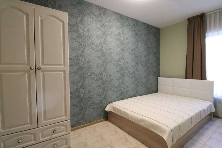 Bright interior of a 2-bedroom ground floor apartment near the sea in Sveti Vlas. Spacious living ar.