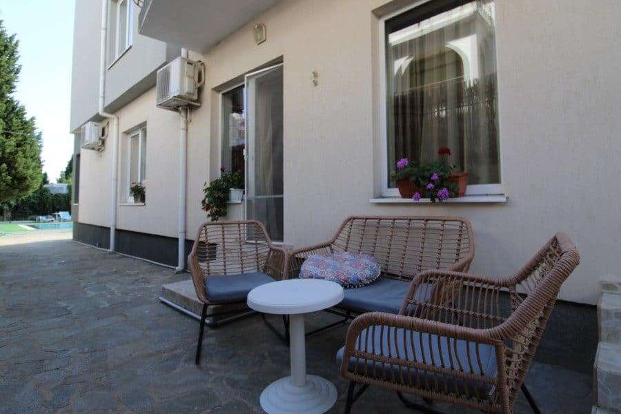 Ground floor 2-bedroom apartment near the sea in Sveti Vlas, Bulgaria, with outdoor seating area and.