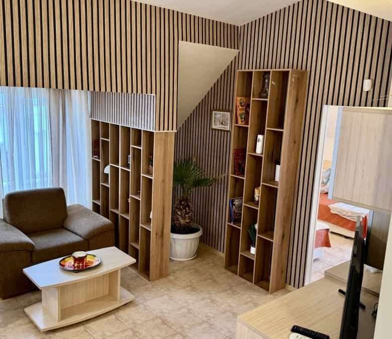 Bright and spacious interior with contemporary furniture and wooden accents.