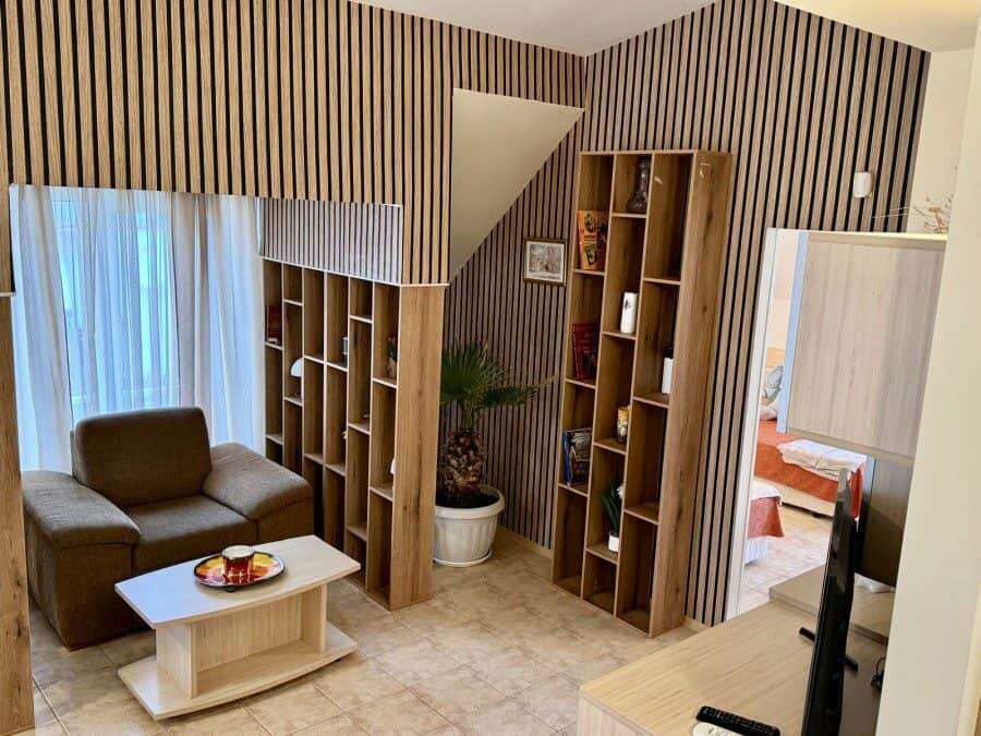 Bright and spacious interior with contemporary furniture and wooden accents.