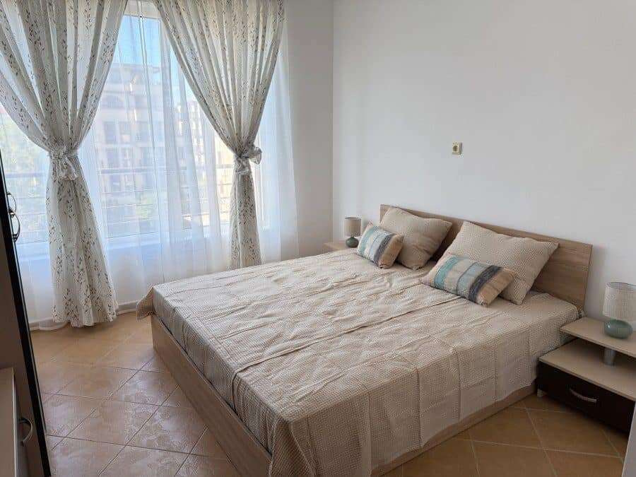 Bright and airy bedroom with large windows and sea views in Solis, Sunny Beach.