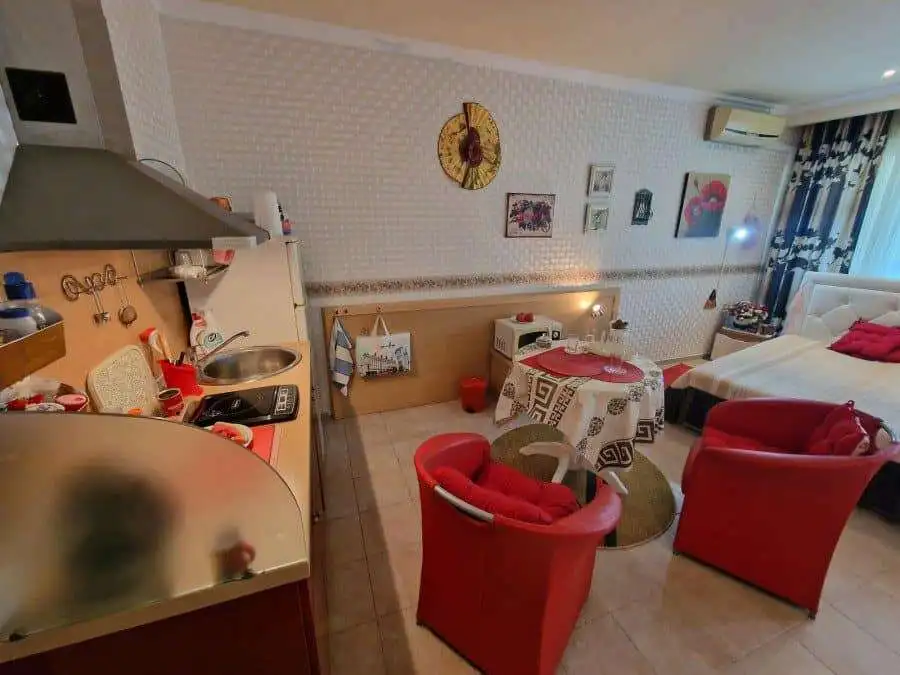 Bright interior of a pool view studio in Planeta, Sunny Beach, just 50 meters from the sea.