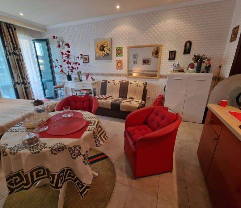 Sunny Beach studio living area with colorful decor and modern furnishings.