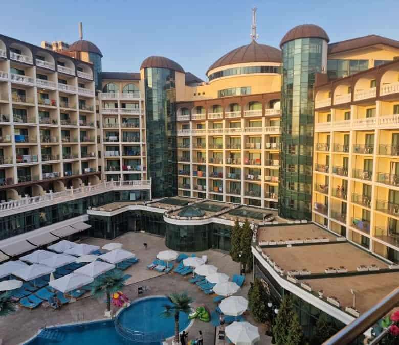 Luxury hotel with pool and sun loungers in Sunny Beach, Bulgaria.