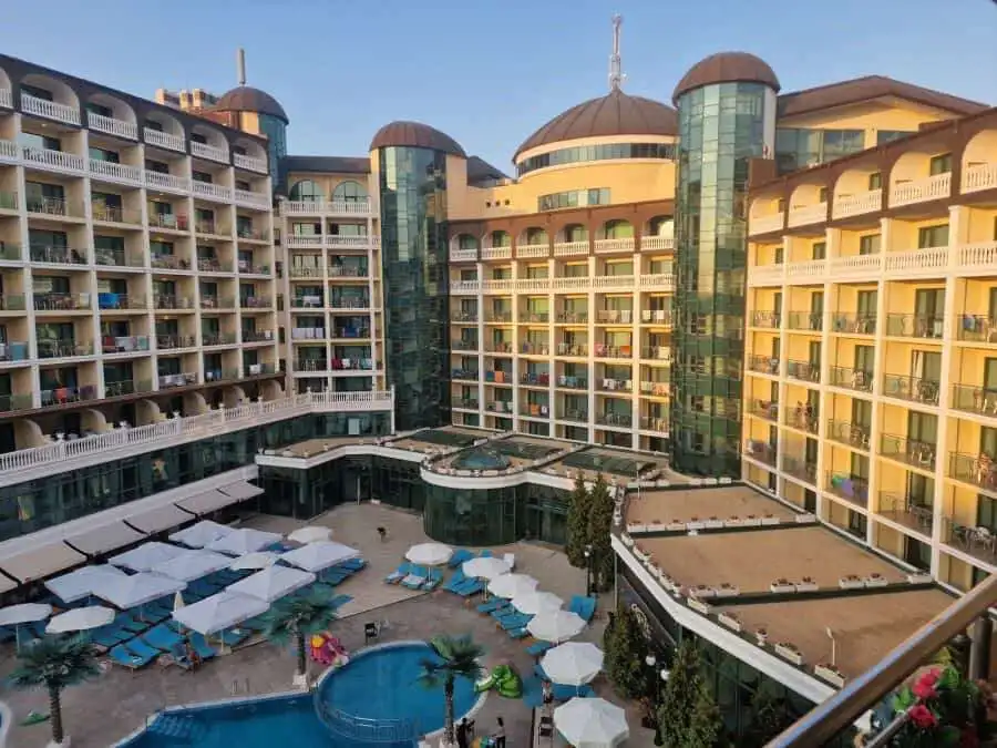 Luxury hotel with pool and sun loungers in Sunny Beach, Bulgaria.