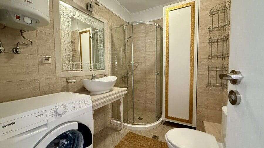 Luxury 1 Bed Apartment in Sunny Beach Bright bathroom with shower in Harmony Suites, Monte Carlo.