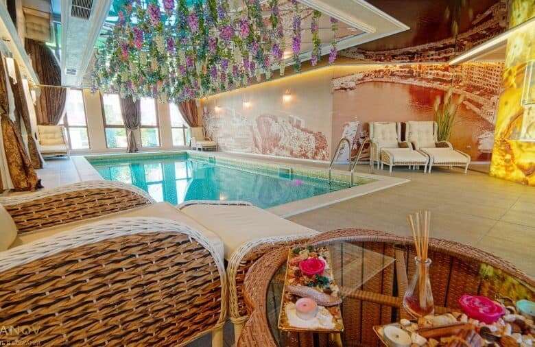 Modern indoor pool at Harmony Suites, Monte Carlo, Sunny Beach.