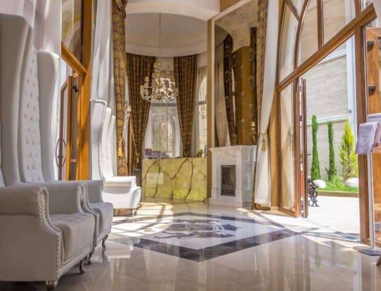 Elegant living room with large windows and luxurious decor in Sunny Beach.