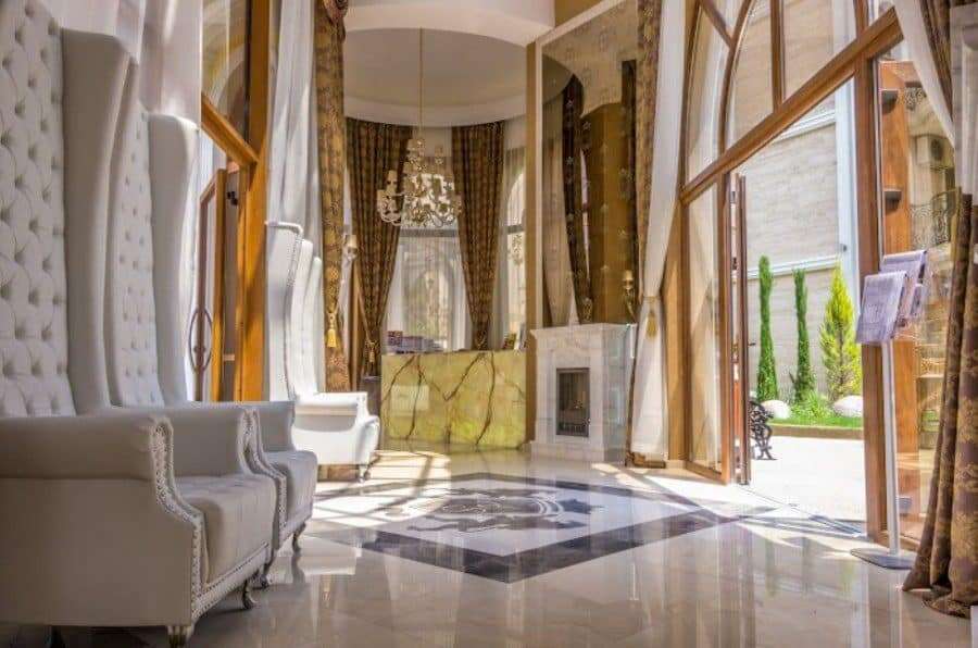 Luxury 1 BED apartment in Harmony Suites Elegant living room with large windows and luxurious decor in Sunny Beach.